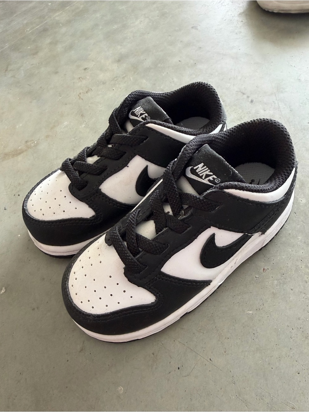 Nike Kids Black and White Low-Top Sneakers with Swoosh